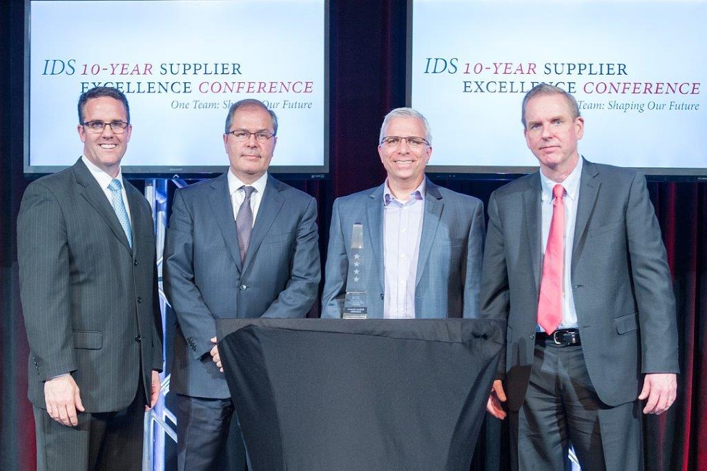 TTI officials receive the Raytheon Integrated Defense Systems 4-Star Supplier Excellence Award