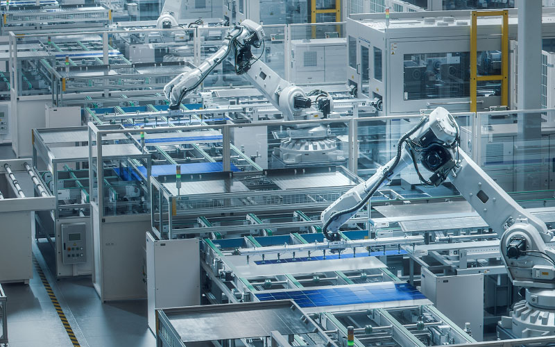 factor floor with robotic arms at work