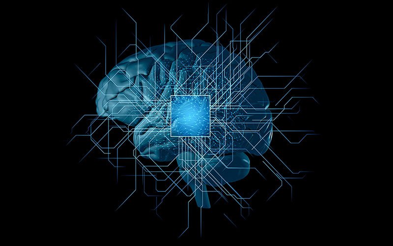 Image of a brain with a glowing microchip and circuit lines, representing AI.