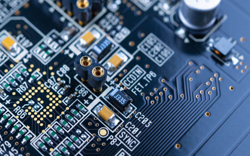 A close-up of an electronic circuit board with various components and connectors.